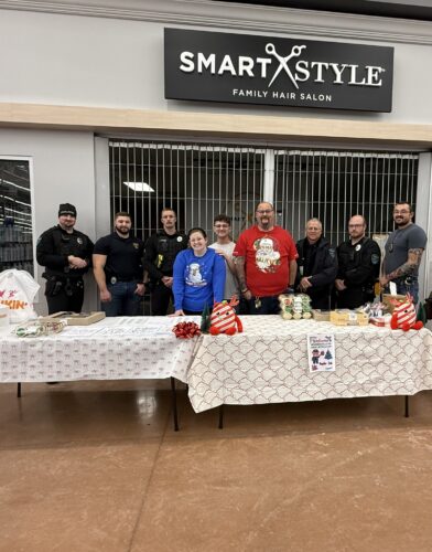 Christmas Comes Early for Dozens of Marshall County Children Through 'Shop With a Cop' Program